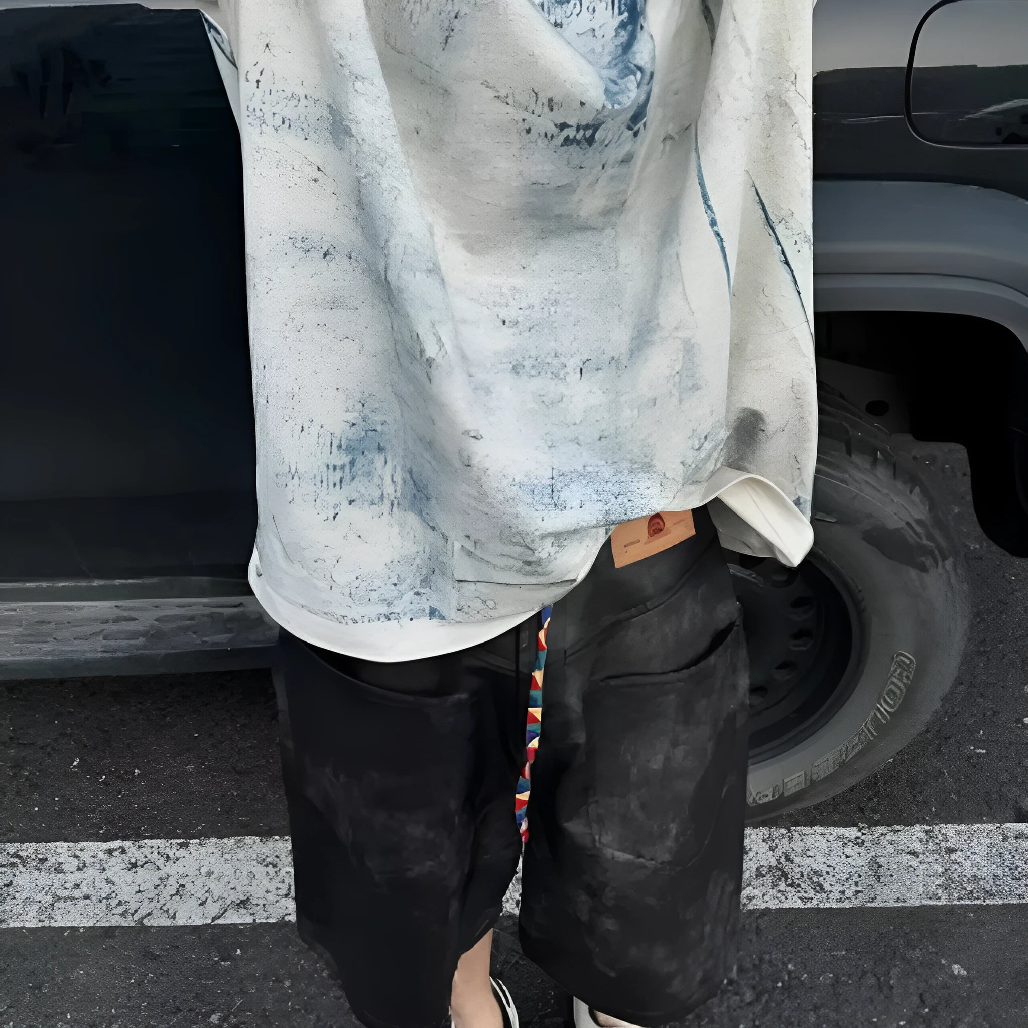 Korean style loose fit t-shirt with tie-dye print and washed aging effect on polyester fabric