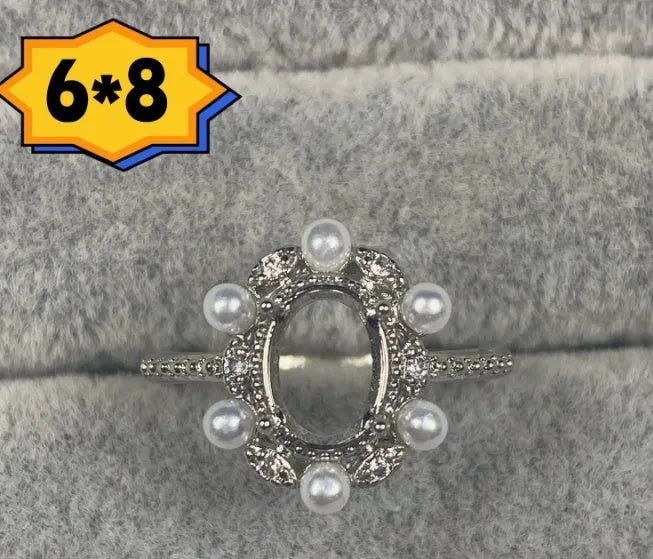 Oval open mouth copper ring with 6x8 mm star and denier pattern ornament.
