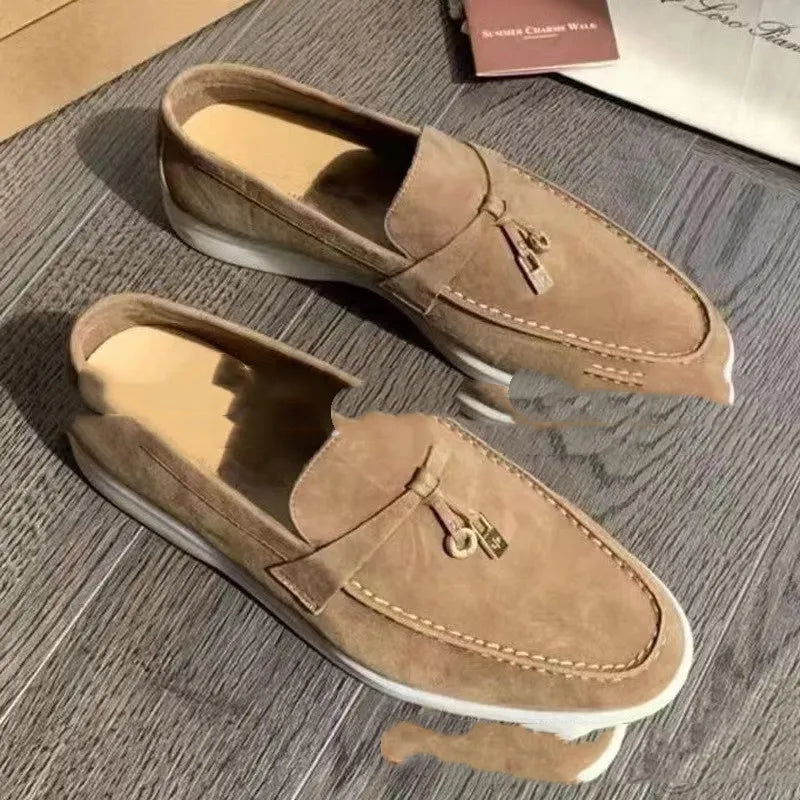 Pair of high-top gommino slip-on loafers in a choice of colours with round toe and rubber sole.