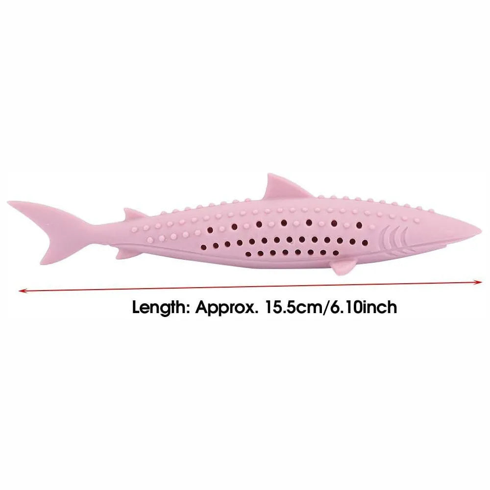 Green silicone fish-shaped chew toy for cats on a white background, showing side air holes.