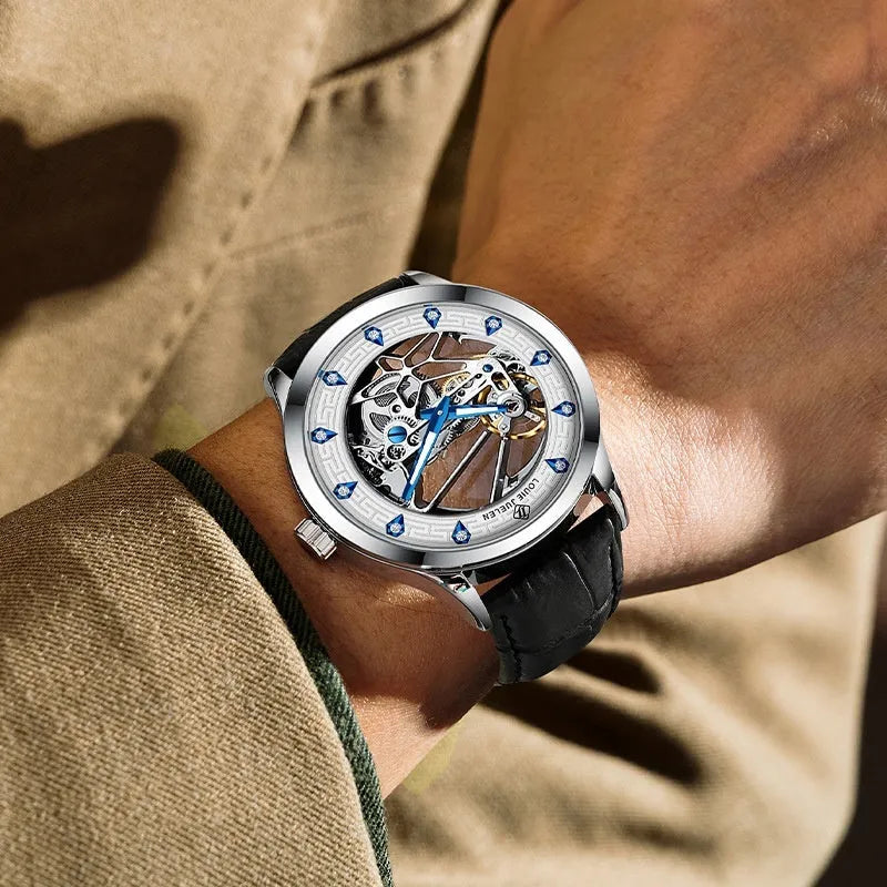 Men's silver stainless steel mechanical watch with white dial, blue luminous hands, and black leather strap