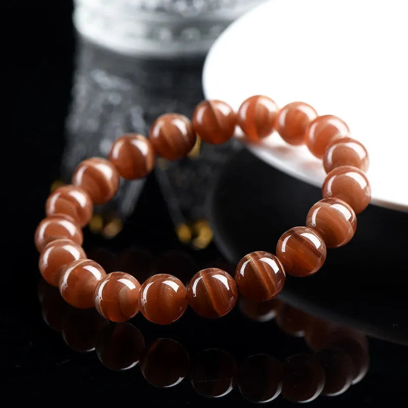 Natural rhodochrosite round bead bracelet with geometric Ruyi design in 6mm or 8mm Peruvian mineral