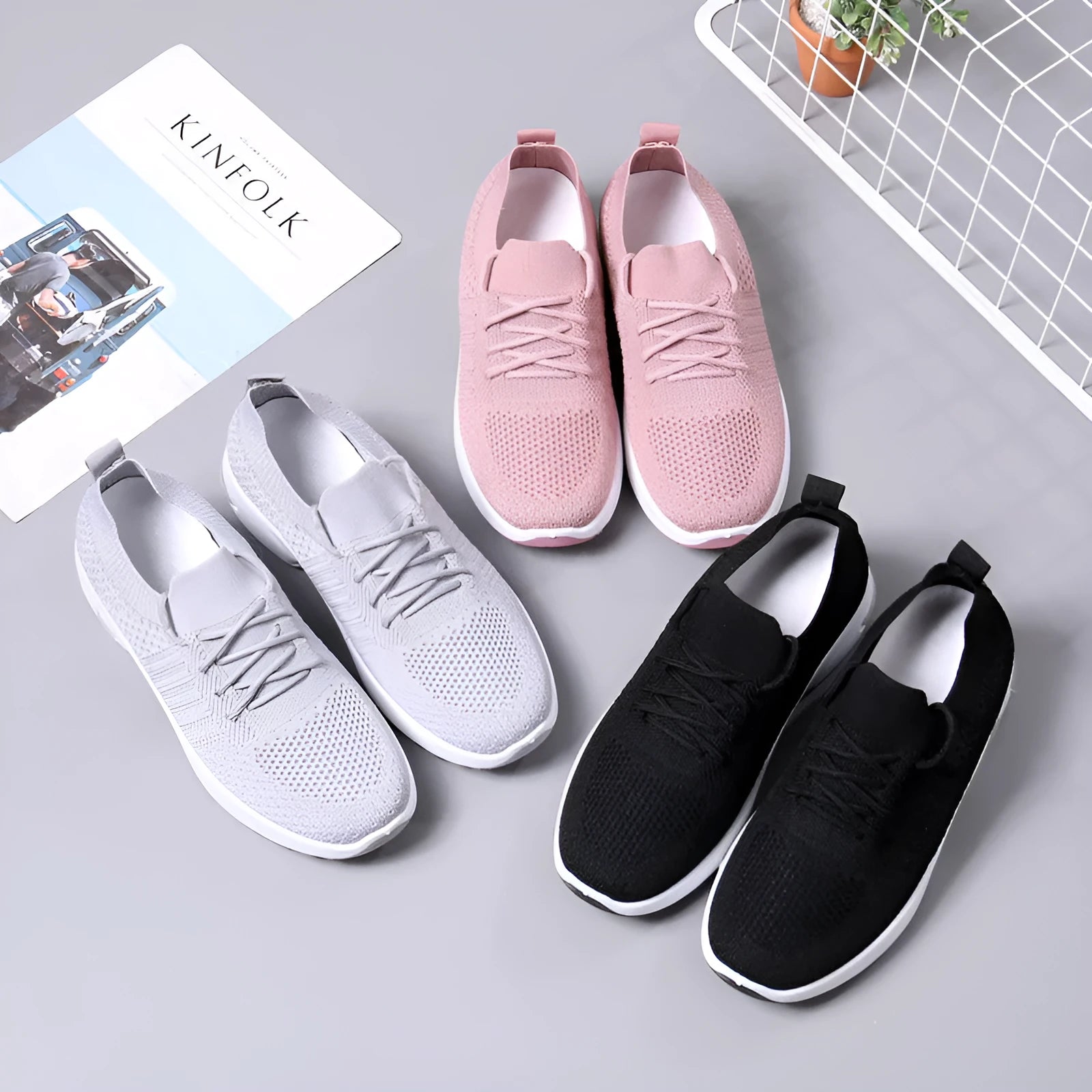 Women's solid colour mesh sneakers with round toe and white lace-up front on a grey non-slip PVC sole.