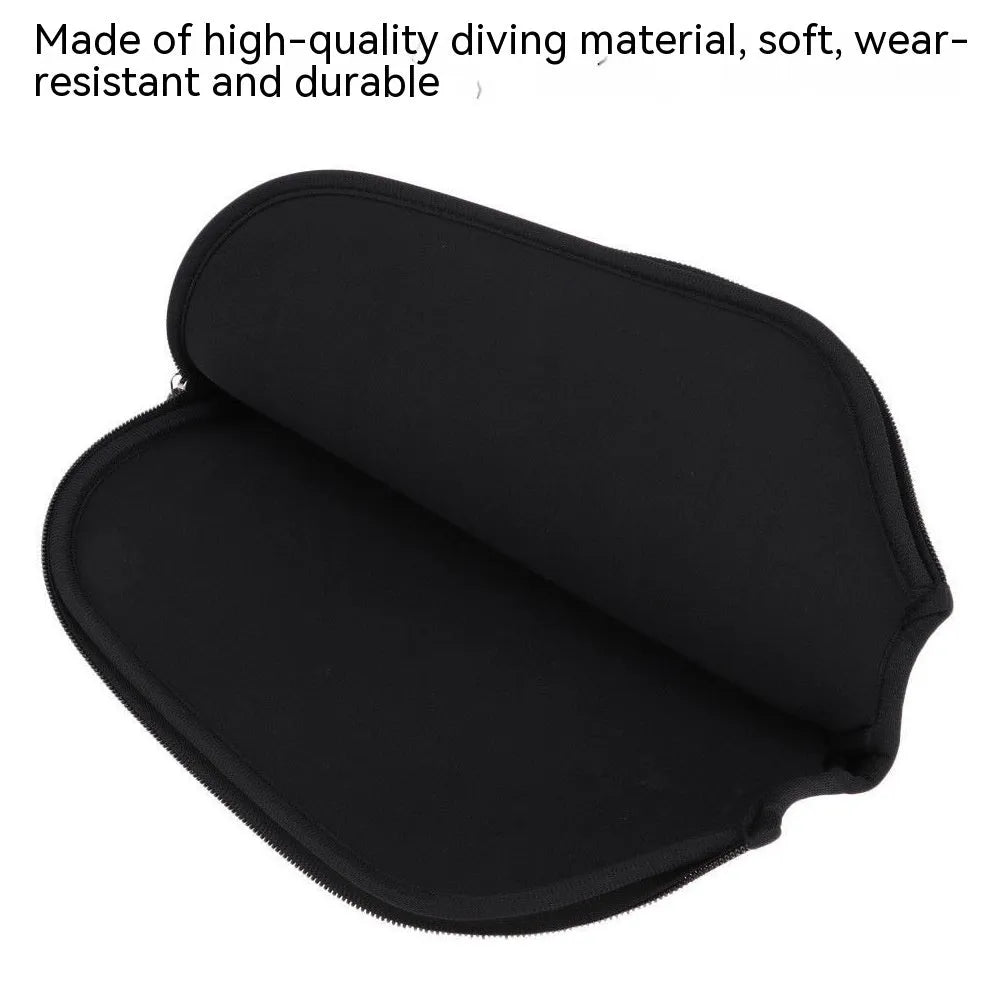 Black neoprene protective sleeve for table tennis racket, laid flat on surface