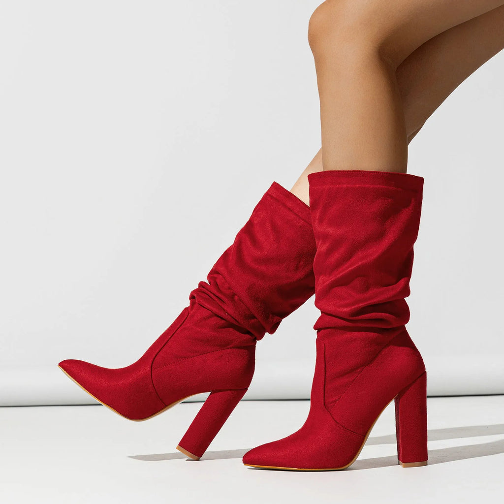 Women's black pointed-toe chunky heel ankle boots with suede upper and super high heel