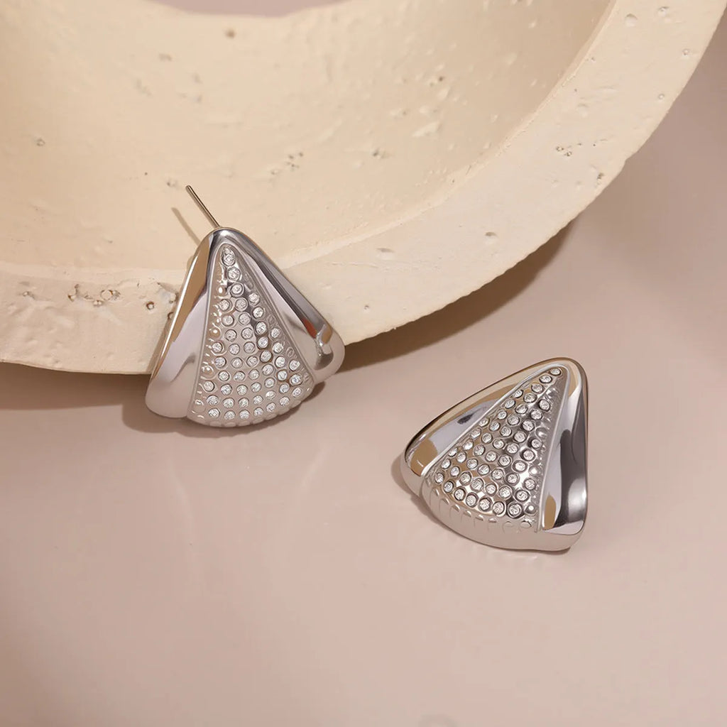 Gold triangle stainless steel geometric stud earrings with electroplated finish on white background
