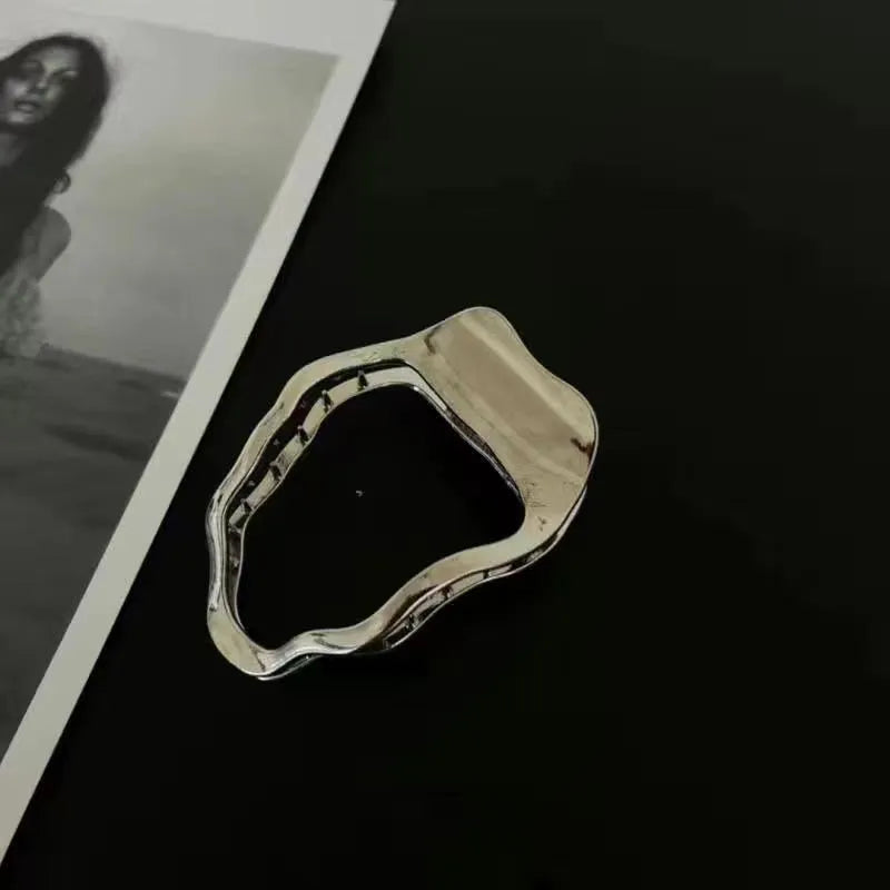 Women's zinc alloy hair barrette in gold colour with triangle shape design