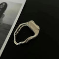 Women's zinc alloy hair barrette in gold colour with triangle shape design