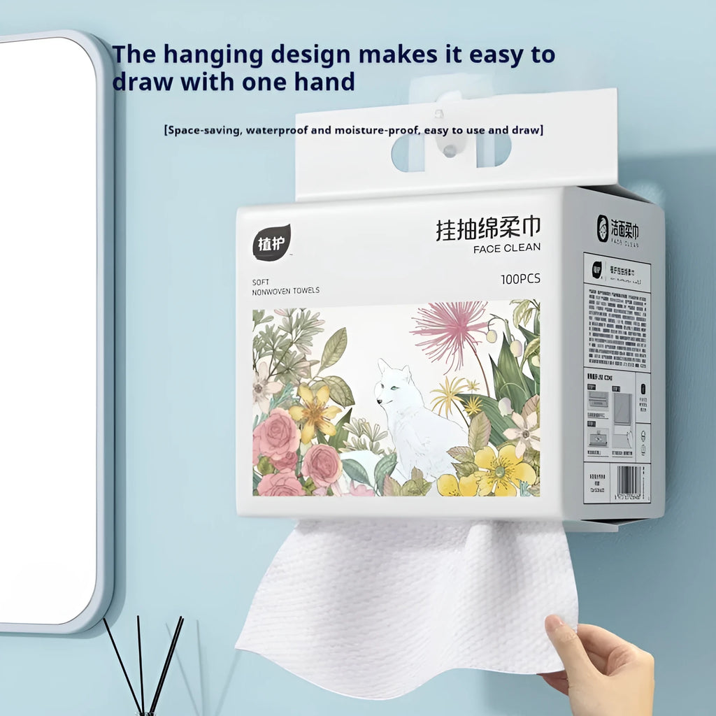 Roll of 100 disposable soft face cloths with a hook for hanging, shown in a soft cotton colour.