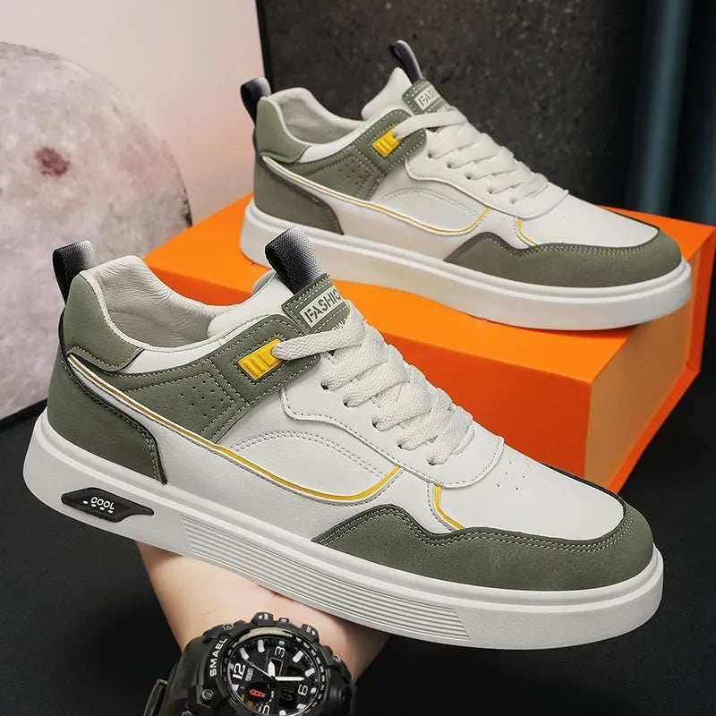 Men's low-top canvas board shoes in solid colours with leather stitching and mesh lining.