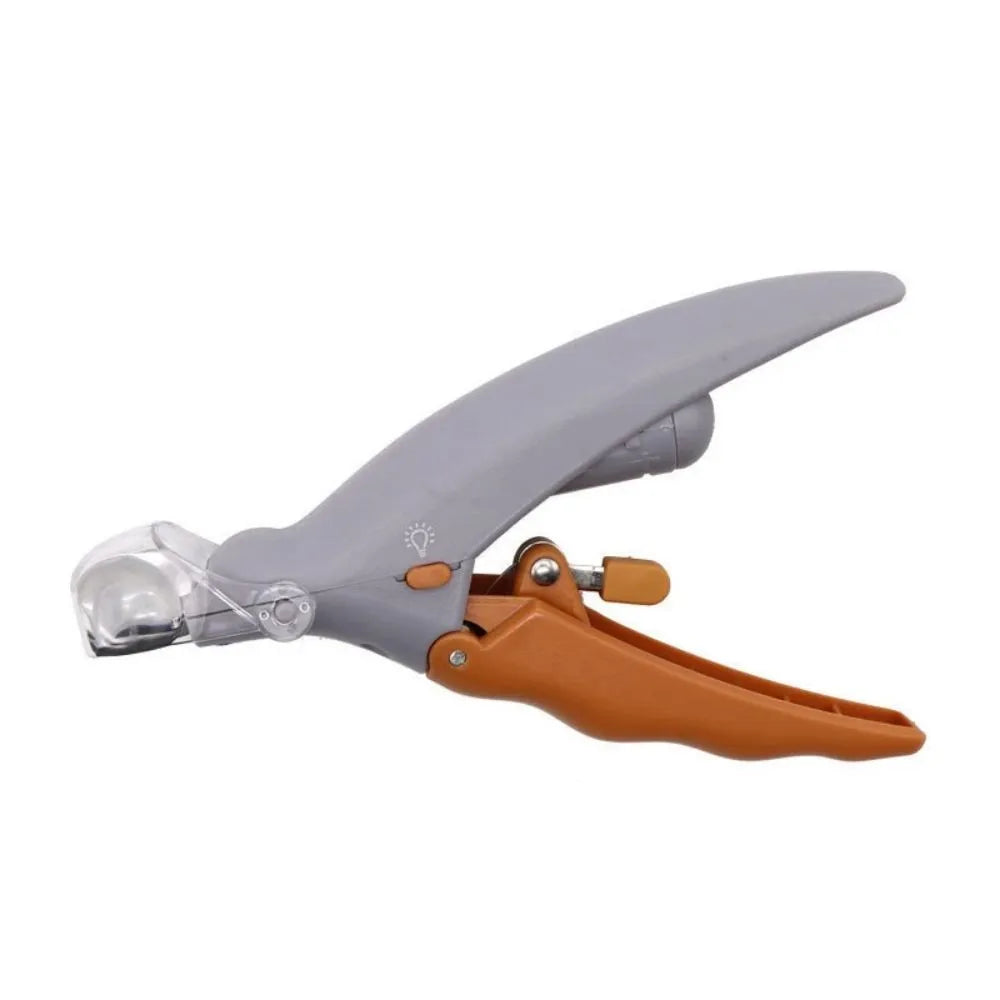 Yellow pet nail clipper with built-in LED light and magnifying feature for dogs and cats.