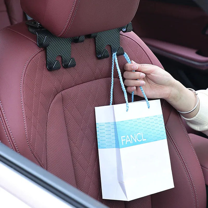 Black car multifunction hook bracket with integrated phone holder for rear seat storage