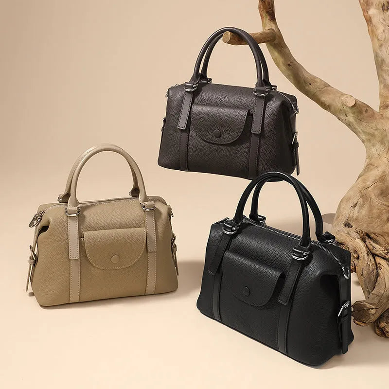 Genuine leather ladies handbag in street trend style with stitching and lock detail