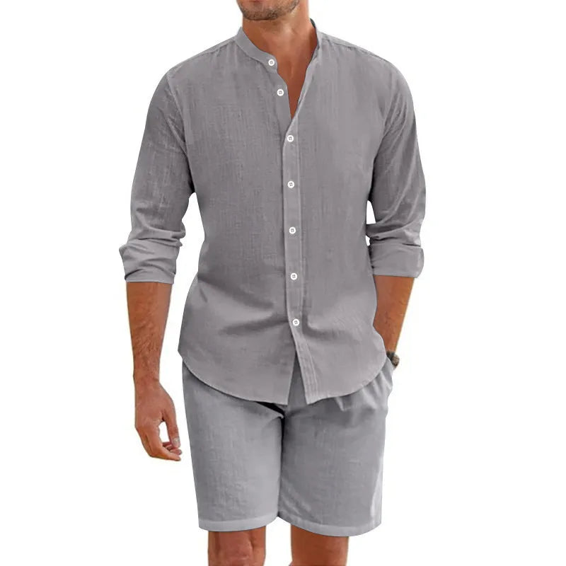 Men's dark grey linen blend short sleeve shirt and matching shorts two-piece set laid flat.