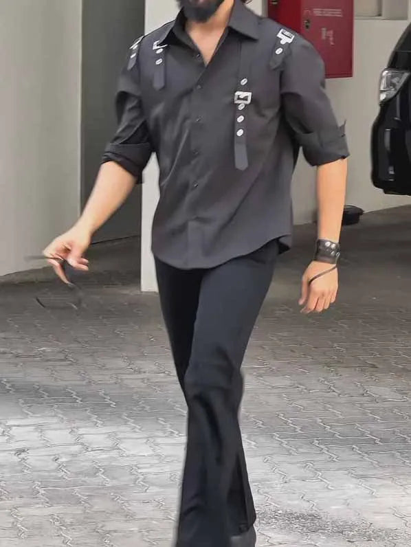 Men's black button-up shirt with traditional collar and regular fit
