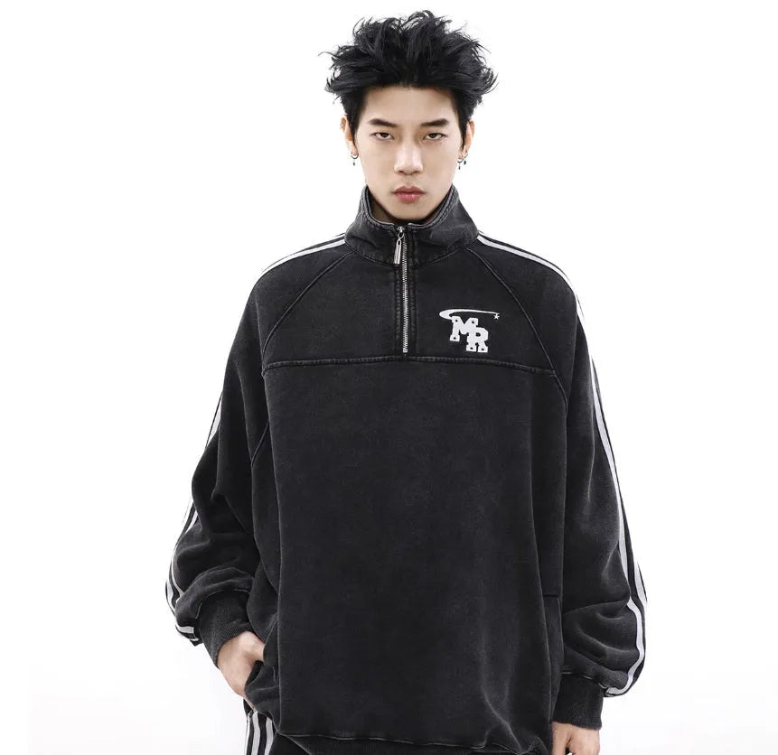 Black Hong Kong style polyester hoodie with stand collar on a hanger.