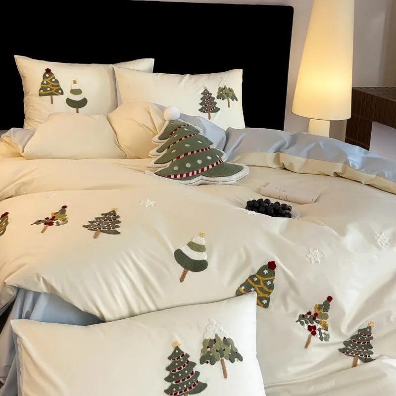 Pure cotton bedding set with embroidered Christmas tree pattern in cream blue or green, showing duvet cover, sheet, and pillowcases.