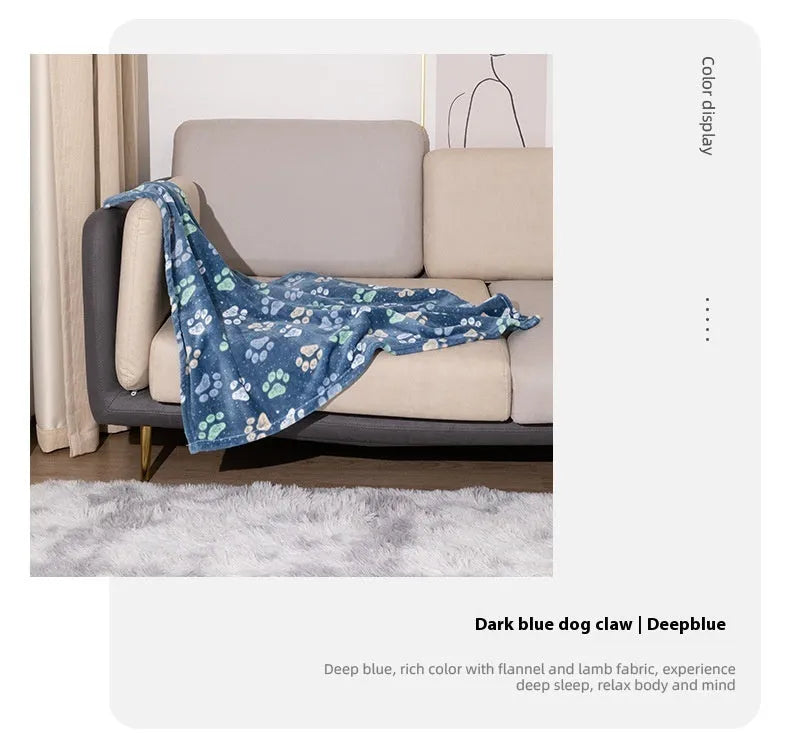 Blue dog cartoon pattern pet blanket laying flat, showing its double-sided thickened flannel texture.