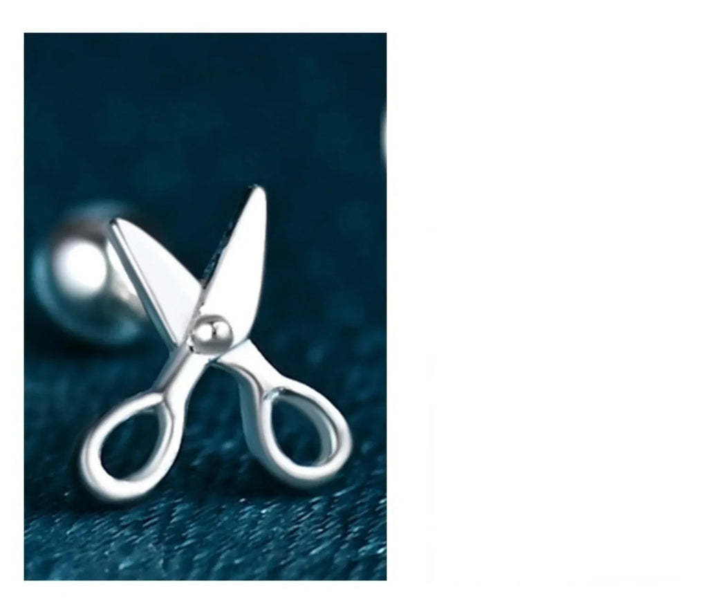 A pair of pure silver ear nails with a miniature scissors screw fastening mechanism.