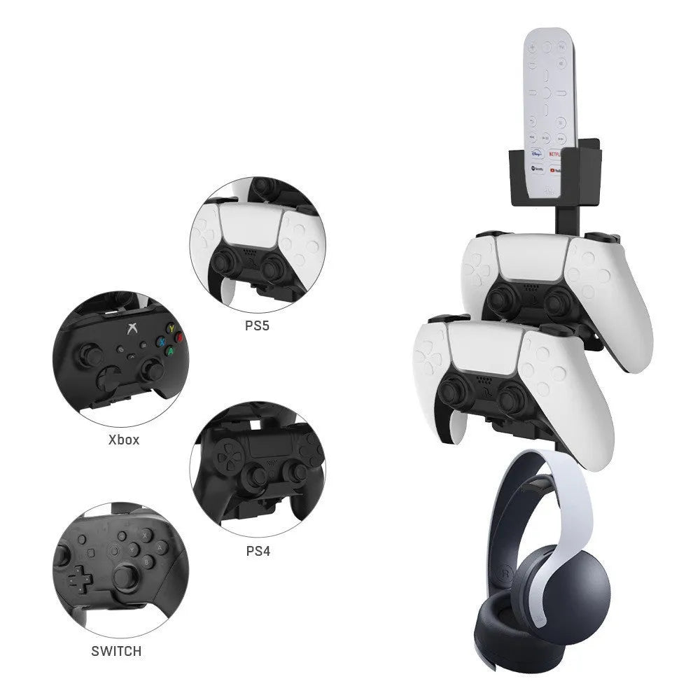 White wall-mounted hook holding PS5 controller with black gaming headset hanging beside it