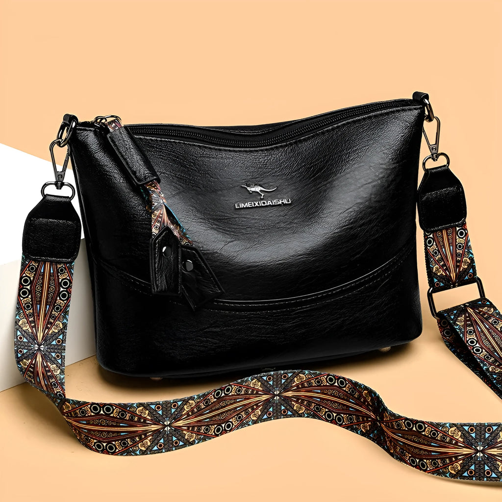 Women's bucket bag in PU leather, crossbody style, outer pocket, black colour, horizontal square shape