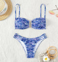 Women's floral bikini swimsuit in blue colour with high-waisted briefs style and nylon lining