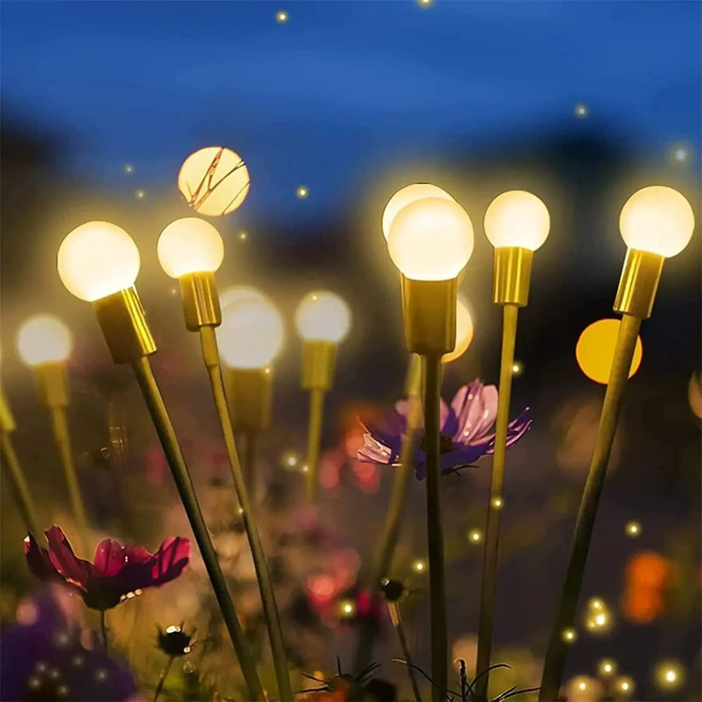 Solar-powered LED ground spike garden light with multiple head cluster options