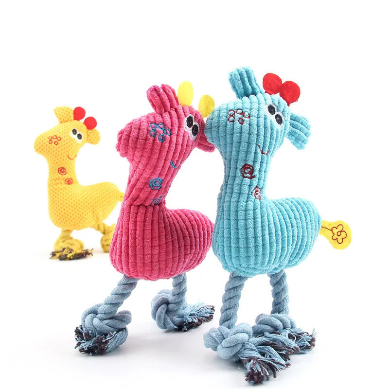Deer-shaped plush pet toy with corn grain texture in blue, pink, and yellow colour options