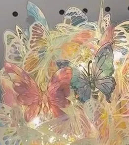 Butterfly night lamp with glass shade and raw wood base measuring 12x15cm