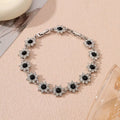 Flower-shaped electroplated bracelet in zinc alloy with colourful crystal accents