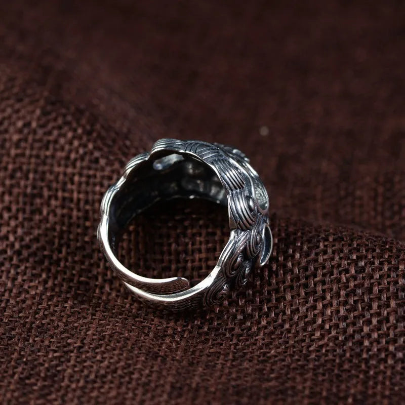 Silver open ring with detailed Jibeast animal zodiac pattern modelling in a retro style.