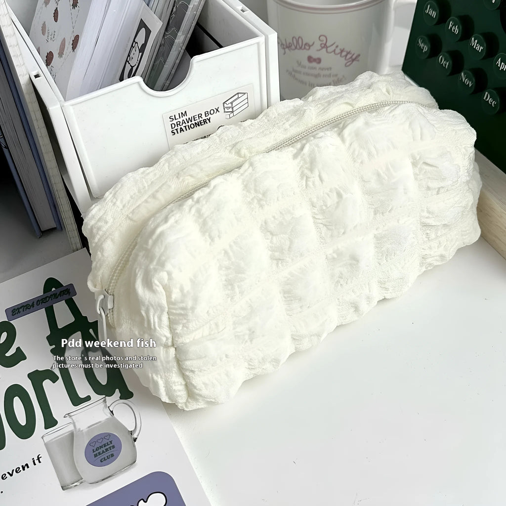 Fabric pencil case with Fashion Personality Cream Puff design in beige and black colour options