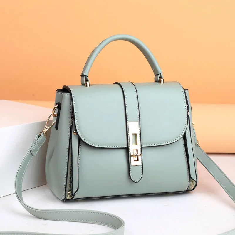 Soft black PU leather women's messenger bag with single shoulder strap.