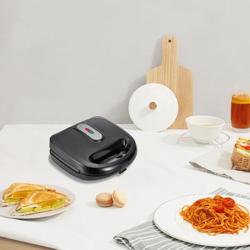 Black double-sided electric sandwich maker with non-stick plates and stainless steel lid