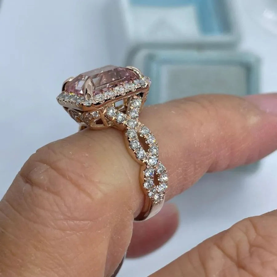 Rose gold geometric electroplated alloy ring on white background, unisex design