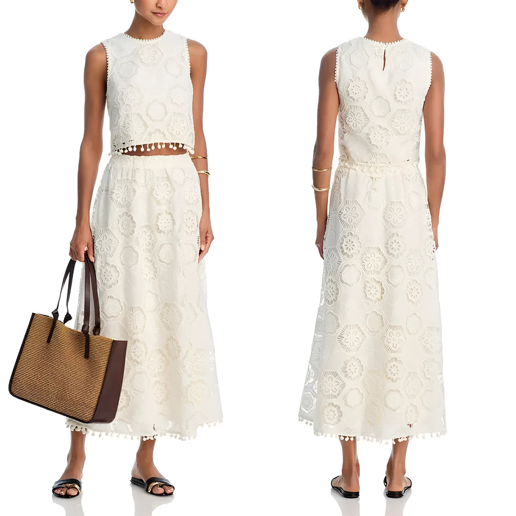 White polyester women's suit set with sleeveless top and long skirt featuring retro embroidery