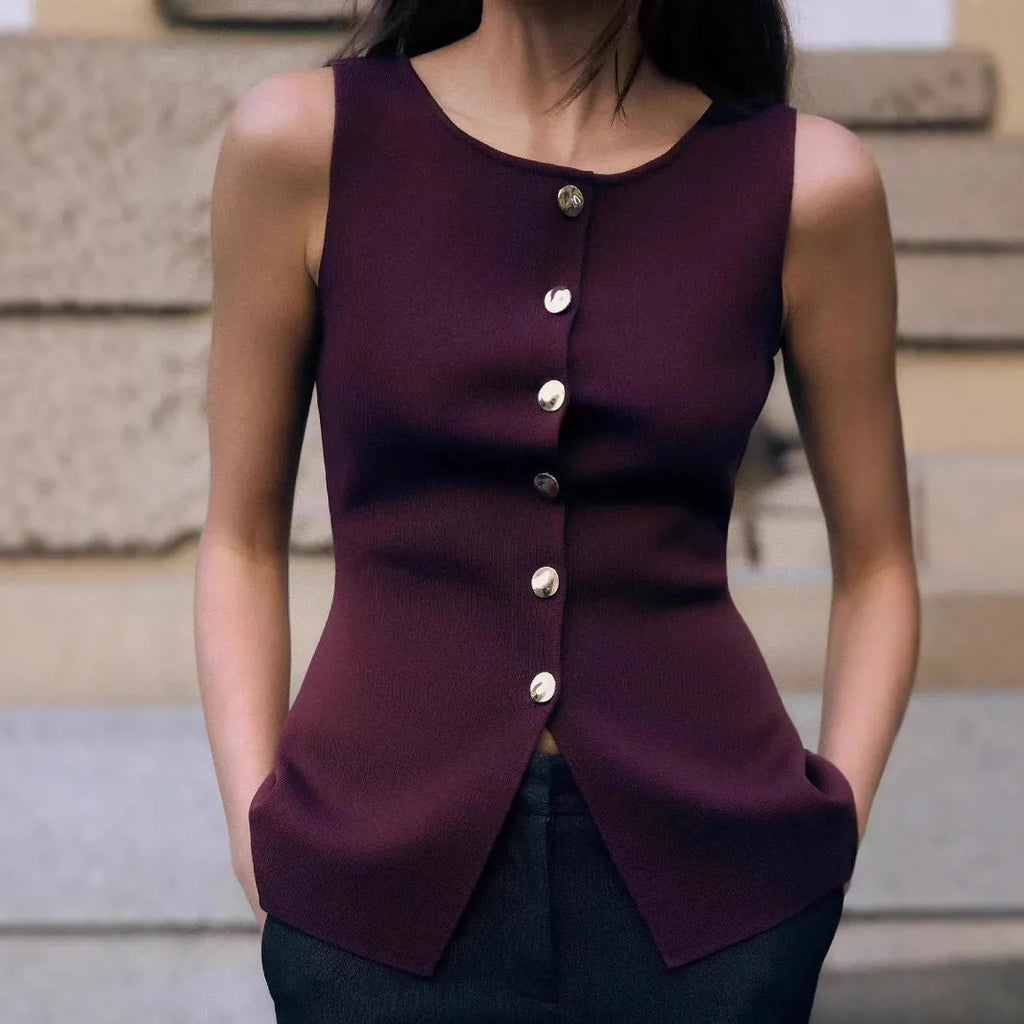 Women's dark red slim fit sweater vest with gold buttons and textured pattern.