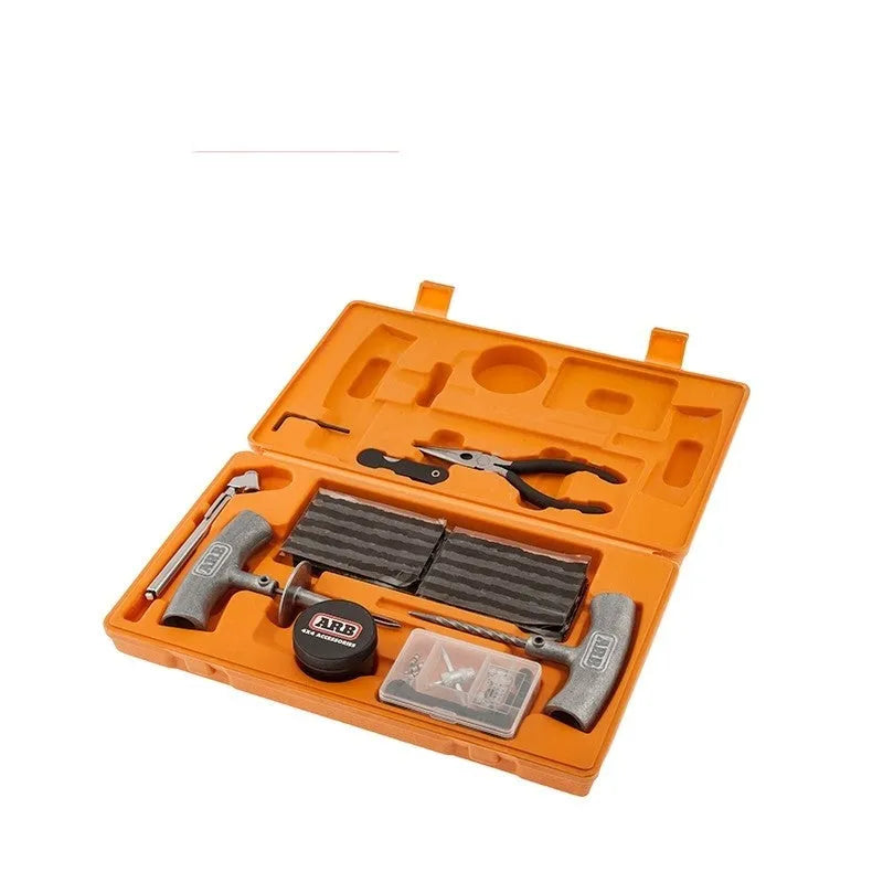 Emergency car tyre repair kit with tools and pressure gauge in compact storage case