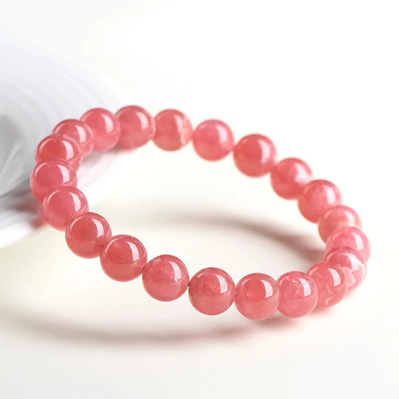 Women's red crystal bracelet with geometric stone beads and longevity lock fastening