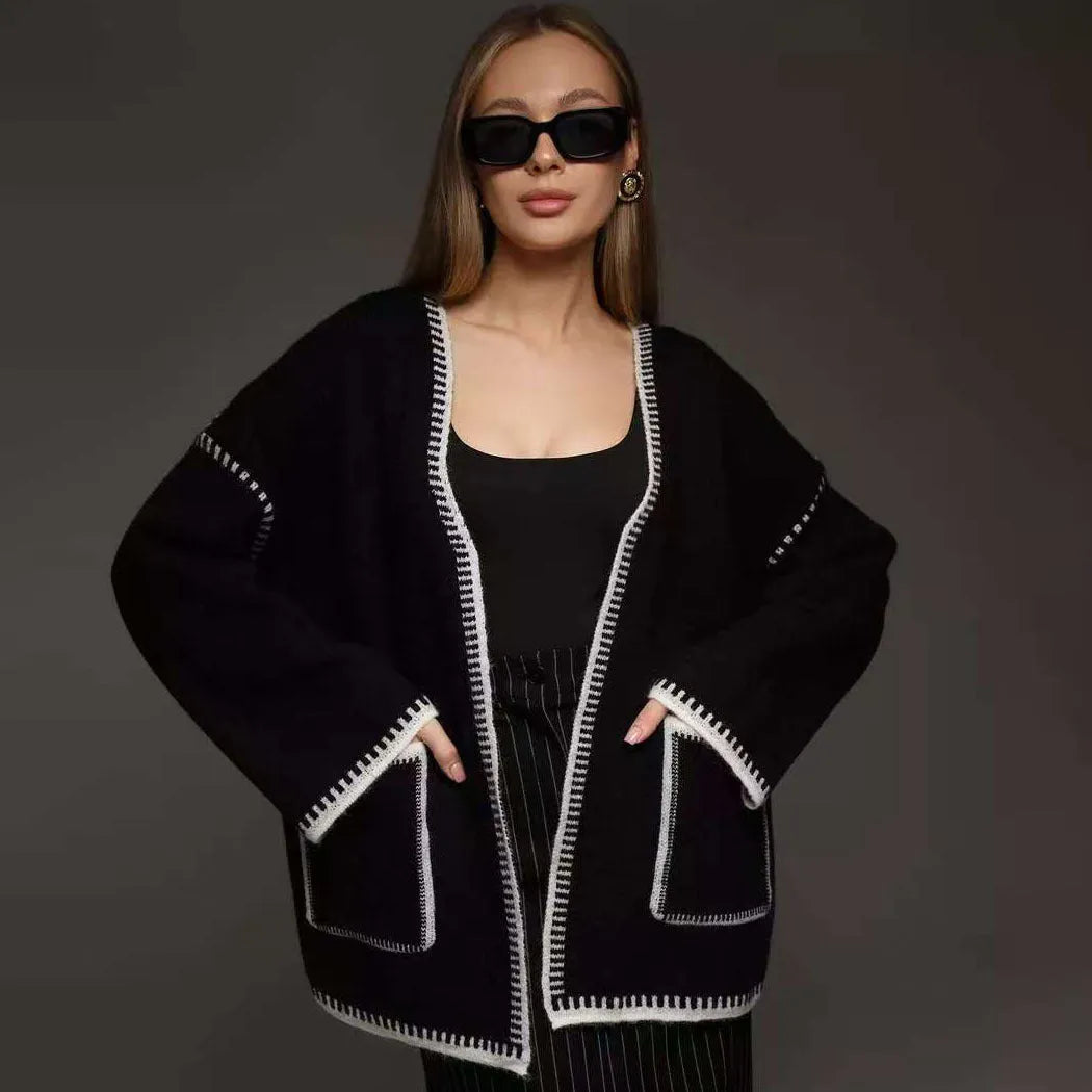 Lace-up front knitted cardigan in a loose fit, shown in black, camel, and white colour options.