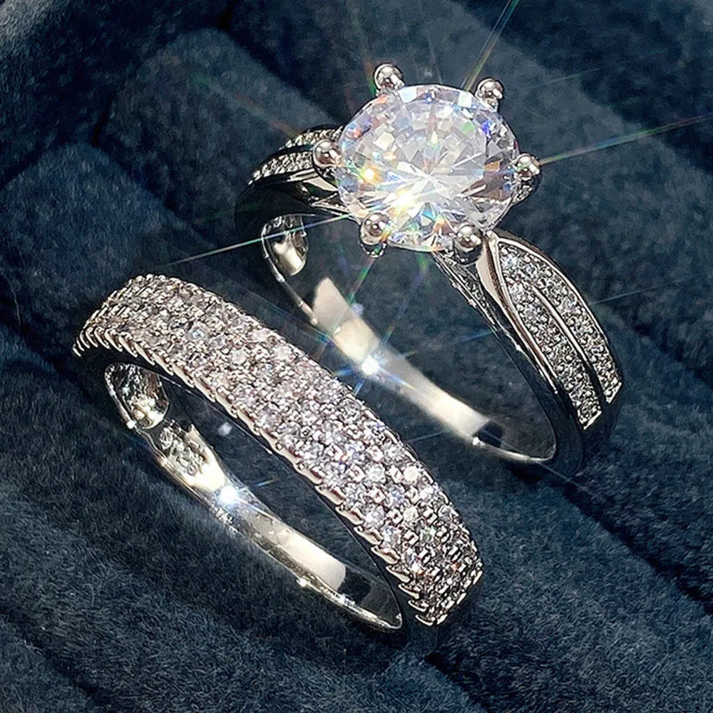 White gold colour alloy wedding bracelet with combined ring design and round geometry elements