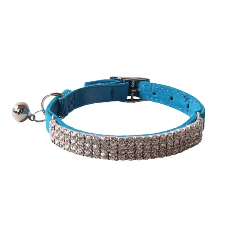 Flocking material cat collar with elastic buckle and gang drill design in assorted colours.