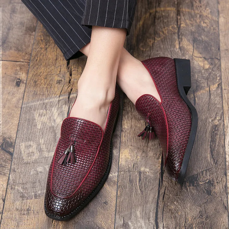 Men's black pointed toe slip on loafers with tassel detail on artificial PU leather upper