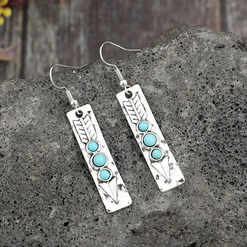 Silver geometric earrings with turquoise inlay on long strip zinc alloy retro design
