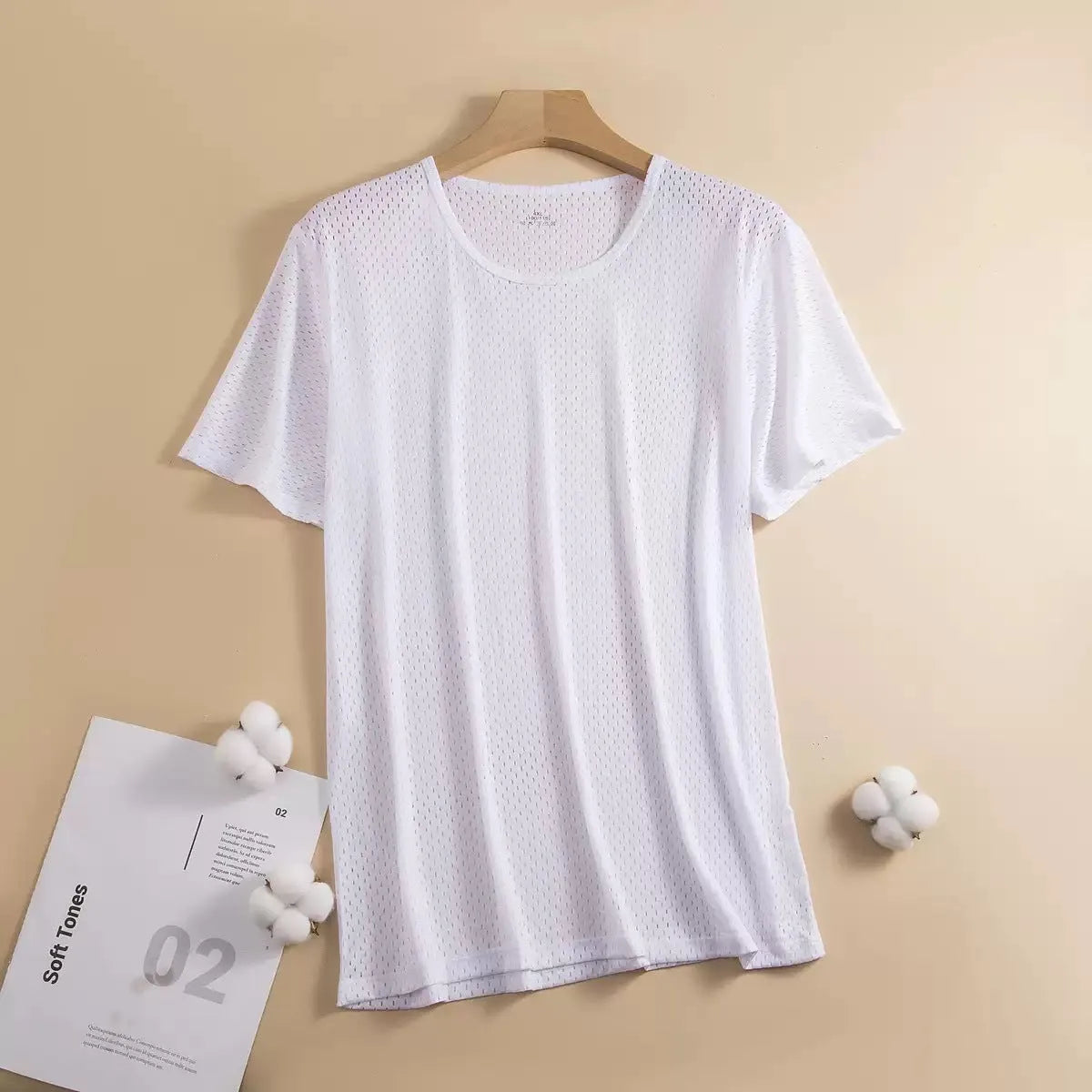 Men's ice silk short sleeve t-shirt in solid colours showing crew neck and loose fit construction