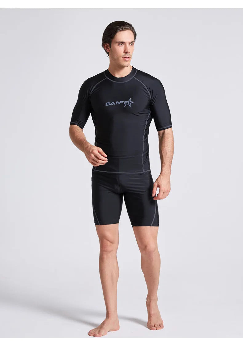 Men's quick-drying half sleeve swimsuit in blue with separate top and pants for snorkelling and surfing