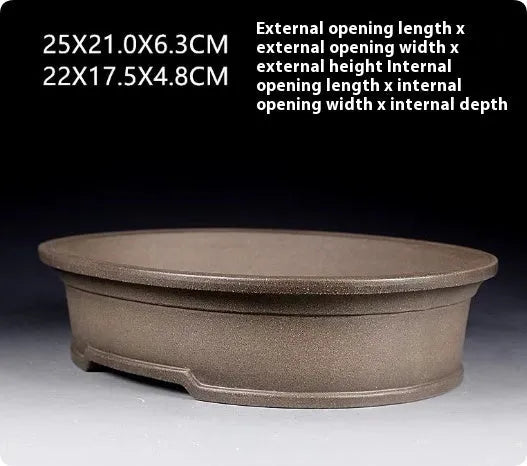 Handmade antique oval purple sand bonsai flower pot, 25cm long by 21cm wide.