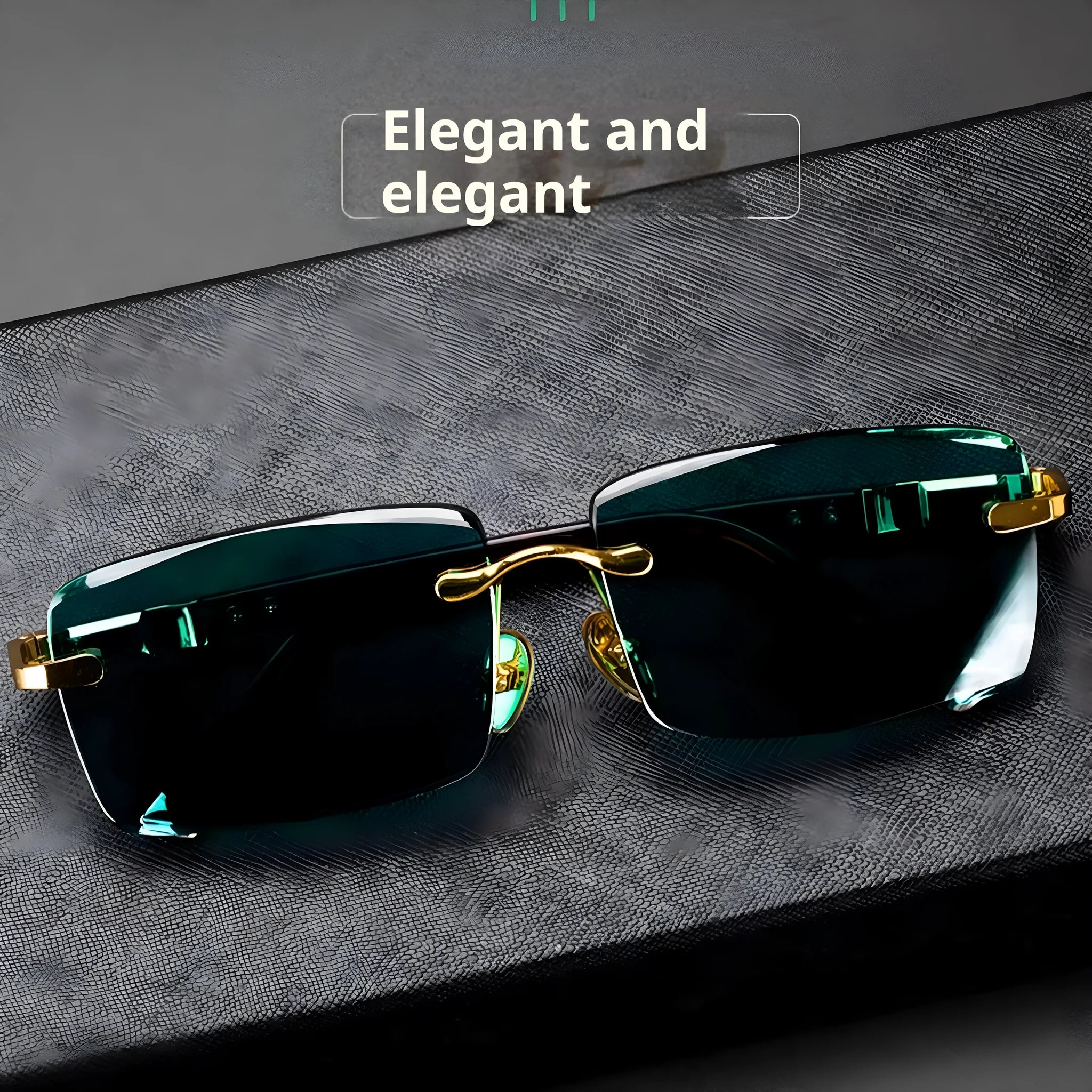 A pair of frameless dark green crystal sunglasses with a hard case and lens cloth.