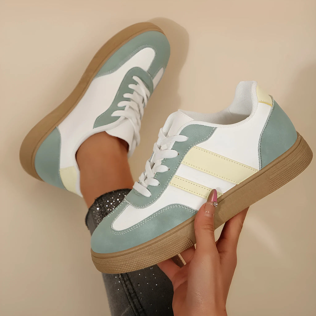 Retro women's casual low-top pumps in green with cross straps and rubber sole