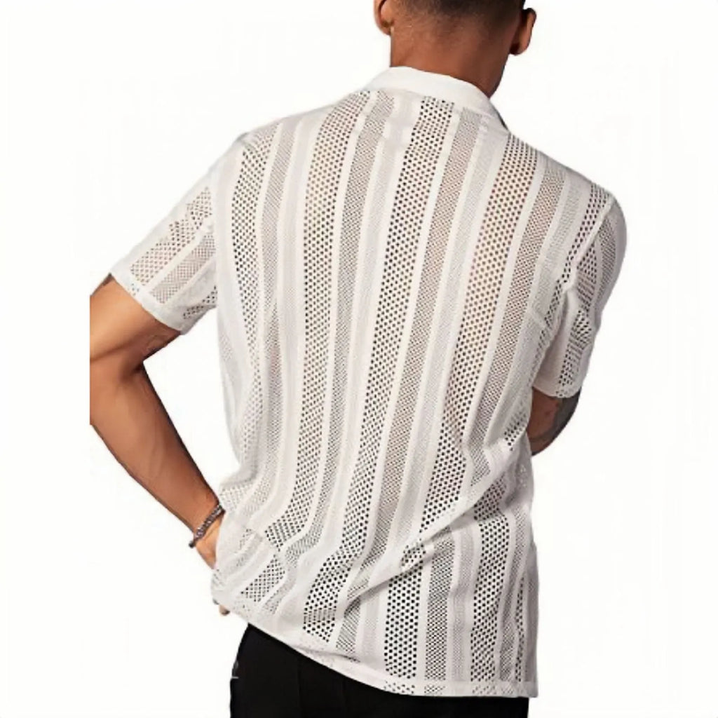Man wearing a black knitted short-sleeved button cardigan shirt with jacquard detailing.